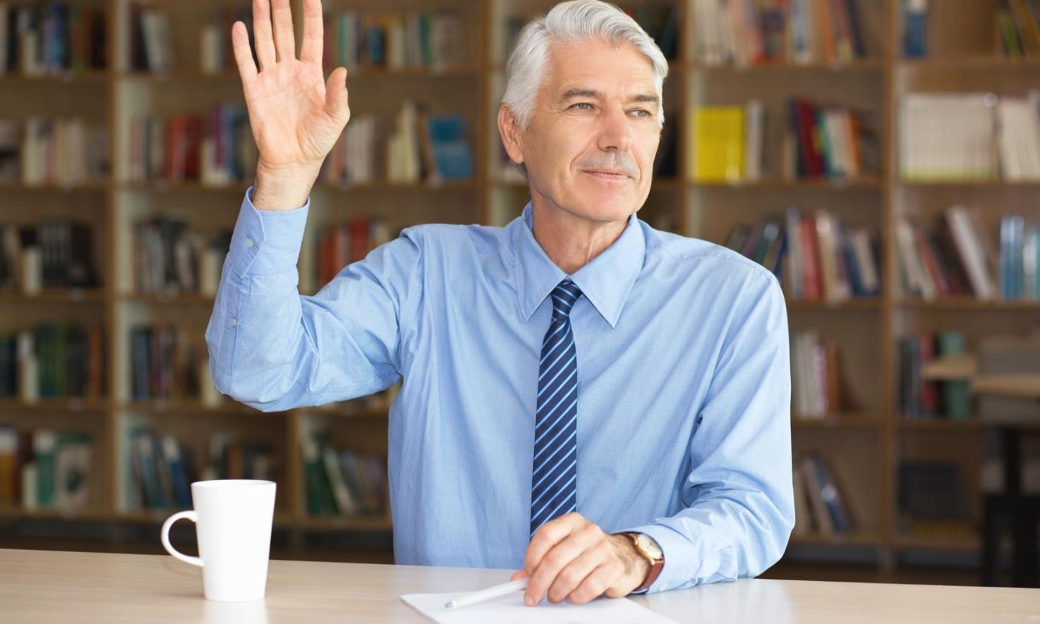 Program development workspace with financial education materials